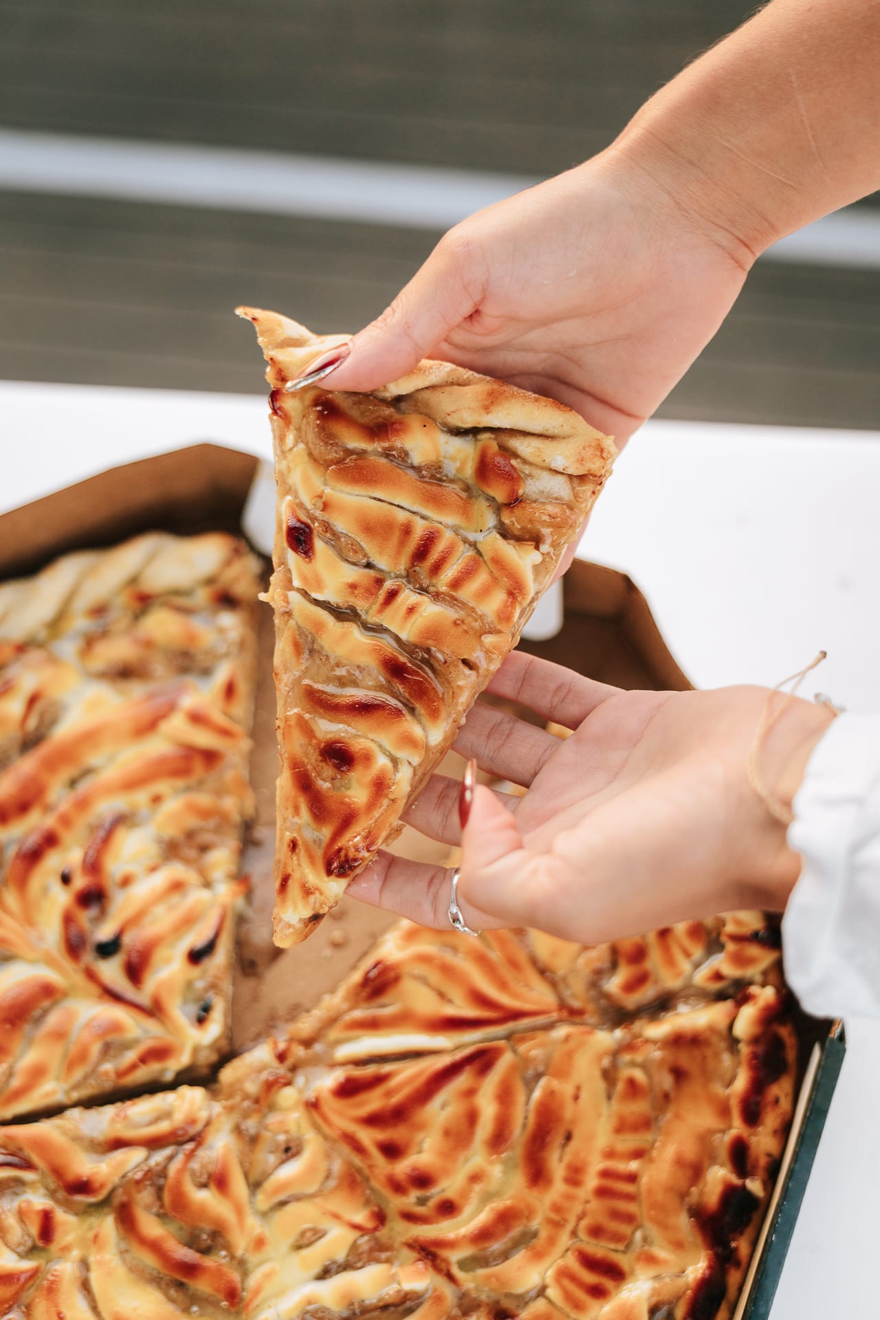 Fatia da Pizza Doce Banana na Neve servida na hora